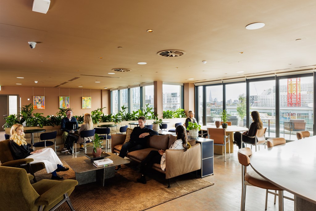 Professionals meet together in penthouse 