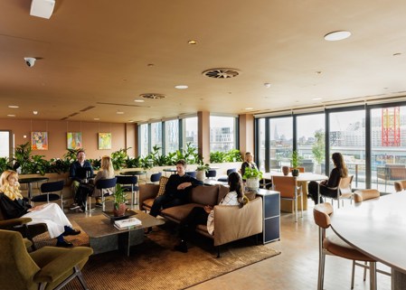 Professionals meet together in penthouse