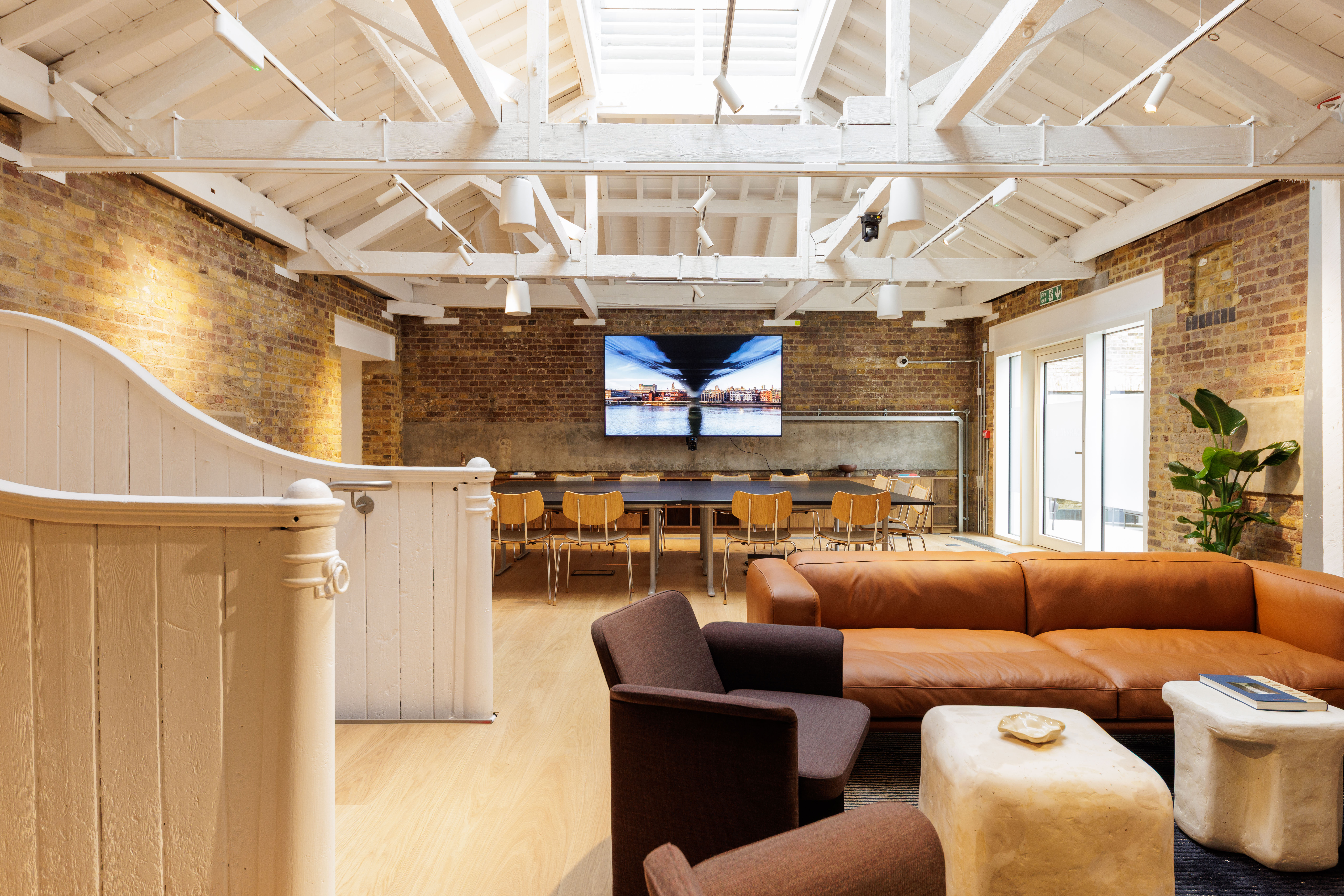 Spacious boardroom with comfortable breakout space 