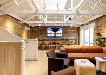 Spacious boardroom with comfortable breakout space