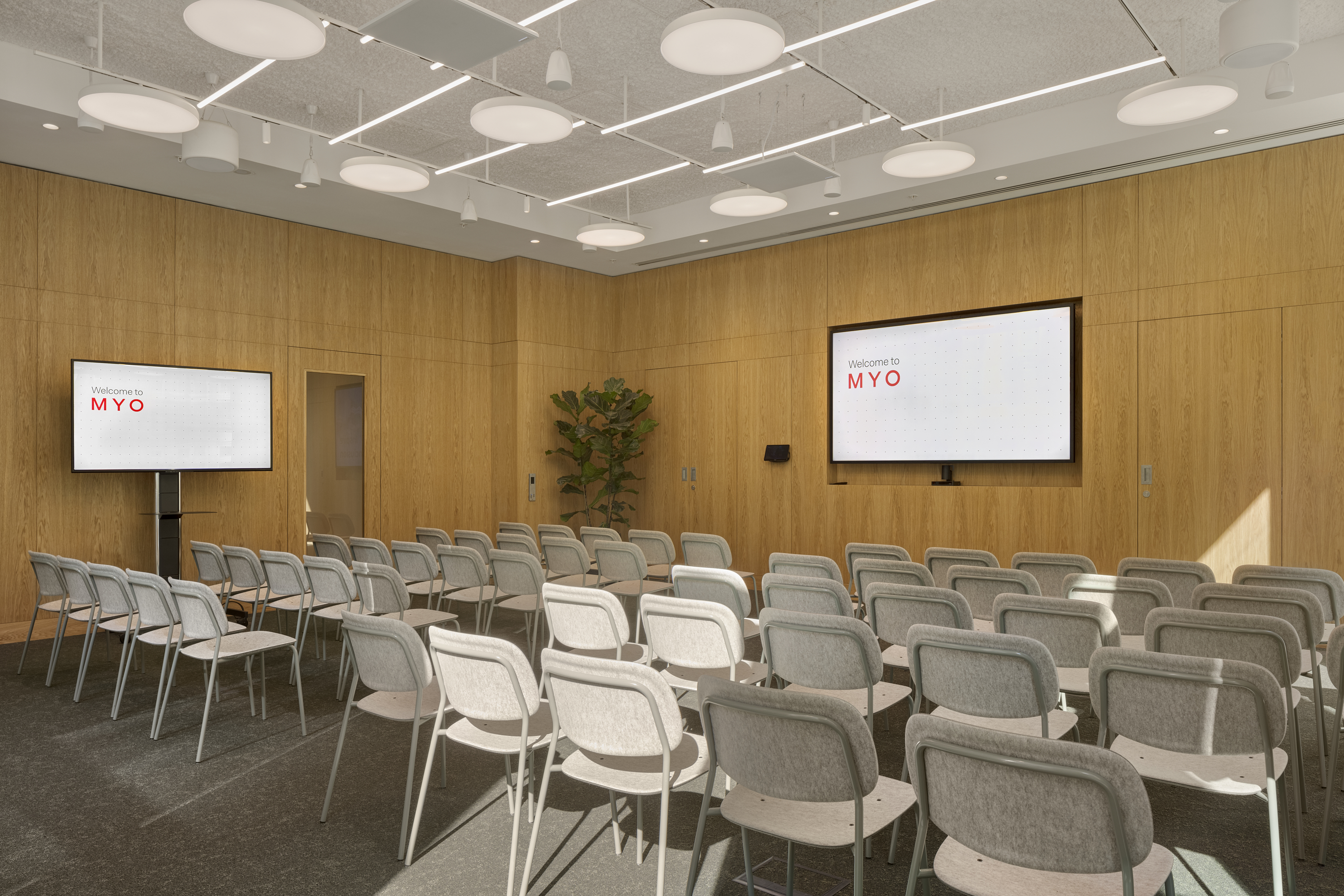 Event space that seats up to 50 people with screens and conferencing equipment.