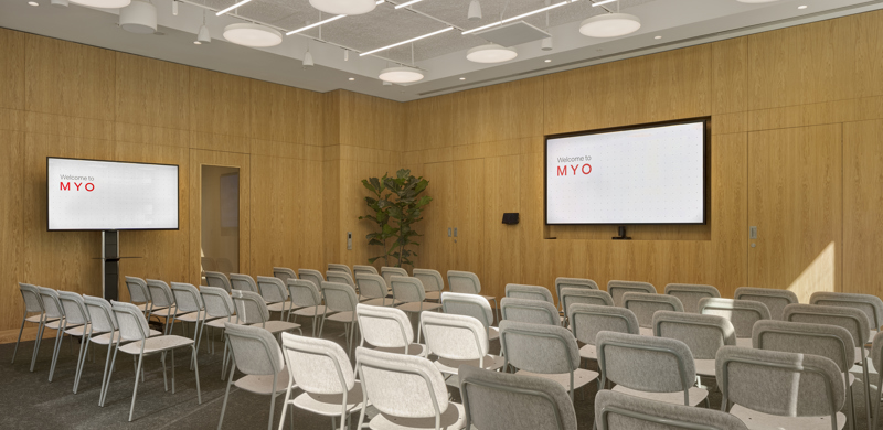 Event space that seats up to 50 people with screens and conferencing equipment.