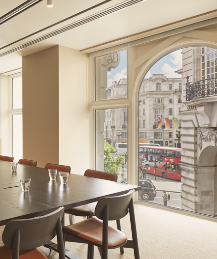 Conference room with large table that seats up to 12 people.