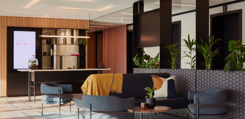 Contemporary lounge area at MYO Liverpool Street featuring comfortable seating, biophilic design elements and flexible spaces for informal meetings and collaboration.