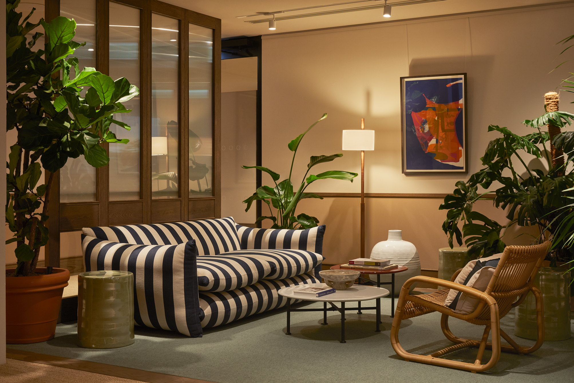 A stylish lounge spacd with low, soft lighting