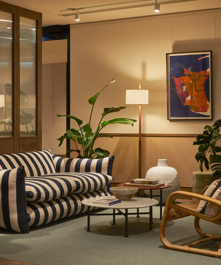 A stylish lounge spacd with low, soft lighting